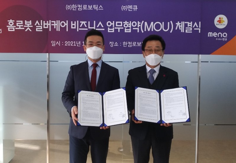 ▲ 왼쪽 전동욱 한컴로보틱스 대표, 오른쪽 강영진 멘큐 부회장